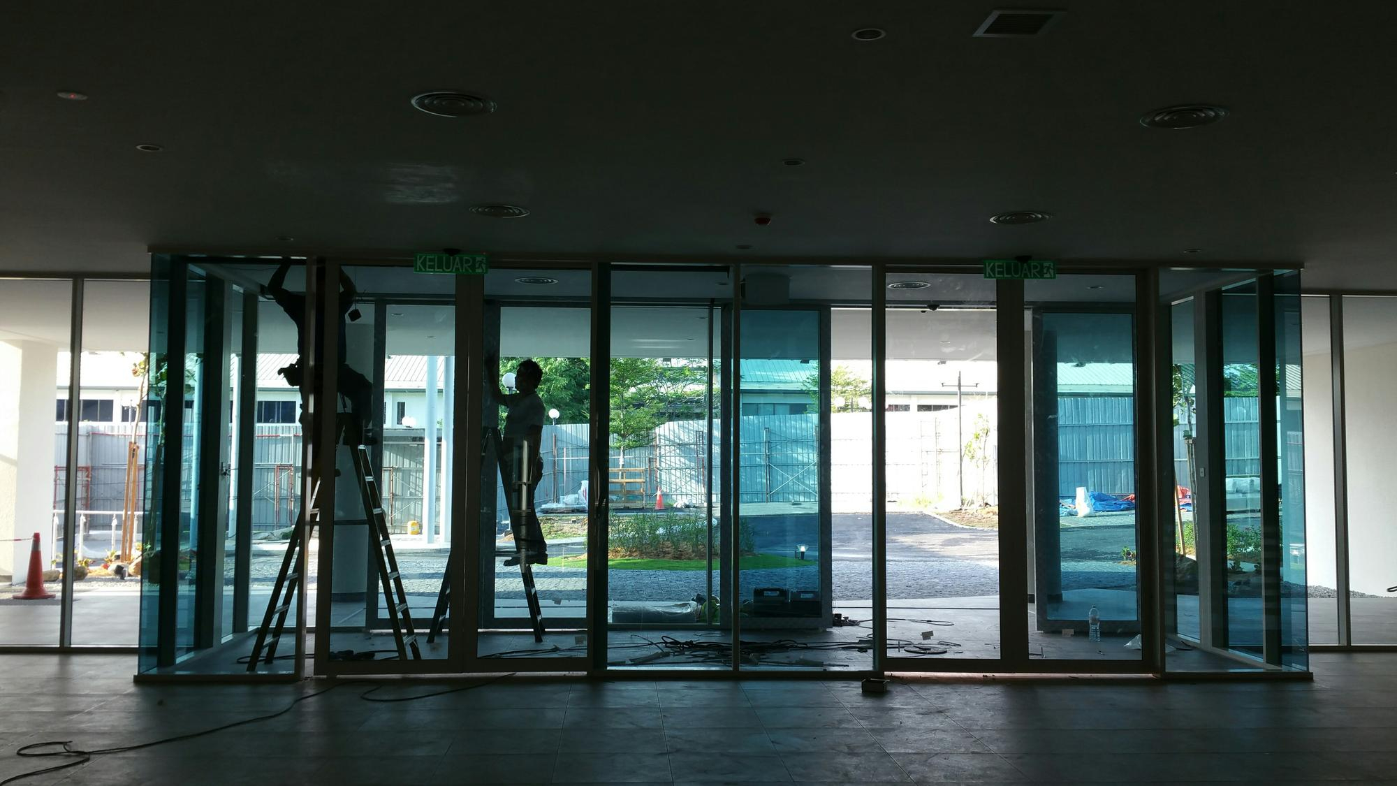 man-working-doorway