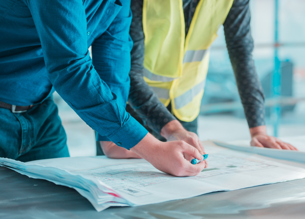 workers-checking-out-architectural-plan-project (1)